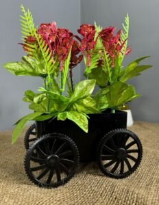 Black trolley with pink flowers