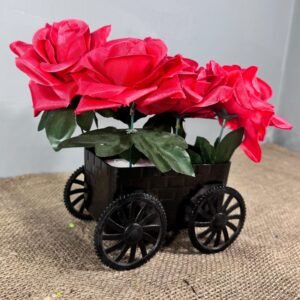 Black trolley with red rose