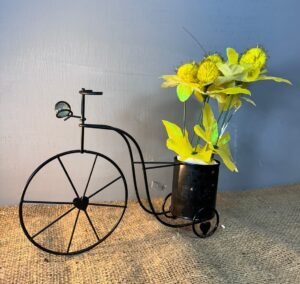 Black Metal Cycle with yellow sun flowers