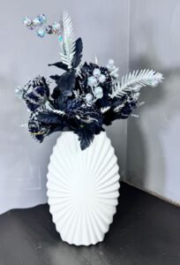 11-Inch Plastic Vase with Black Glitter flowers