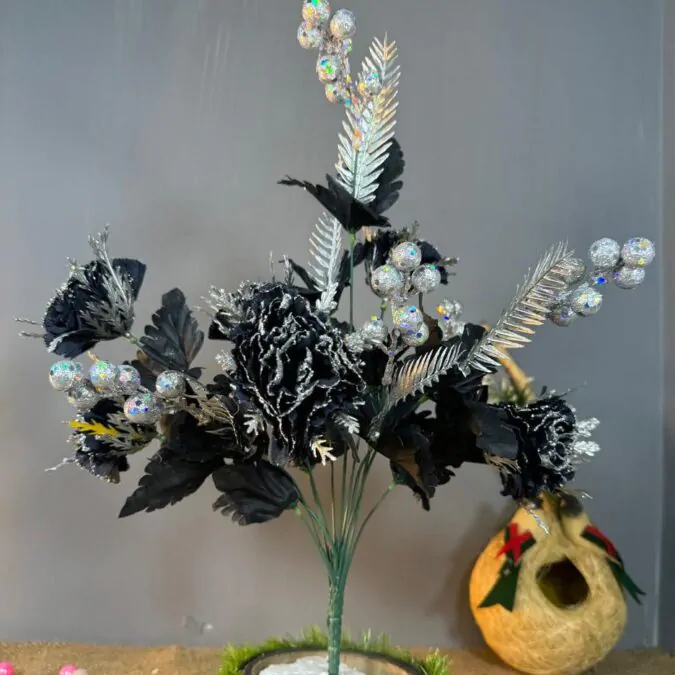 Large black flowers with black cherry bunche