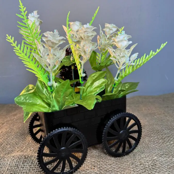 Black trolley with Jasmine flowers