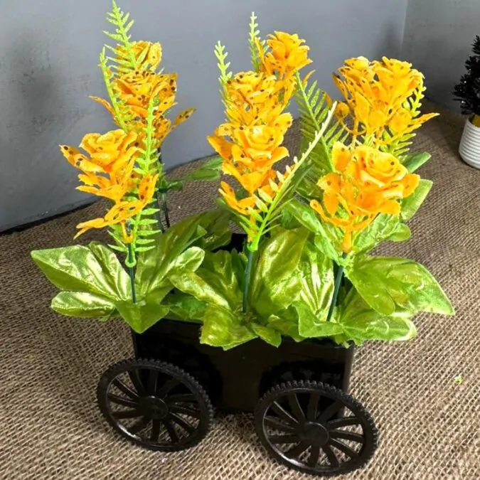 Black trolley with yellow flower