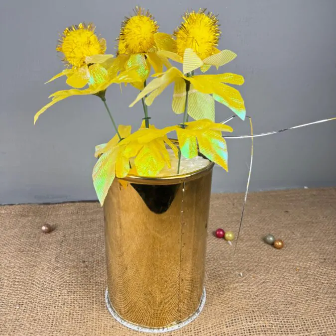 7.5 inches Golden Metal Planter with yellowe flower