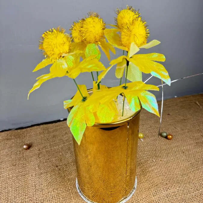 7.5 inches Golden Metal Planter with yellowe flower